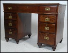 A 19th century mahogany and brass campaign desk.