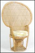 A vintage late 1970's retro wicker peacock armchair -chair. Large open back chair with woven seat.