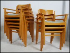 A group of eight retro / vintage beech wood stacking dining / staff room chairs.