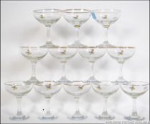 A collection of twelve vintage / retro collection of Babycham advertising glasses,