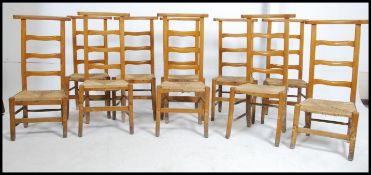 A set of 10 French beech wood rattan weave prie-dieu chairs being raised on squared legs having