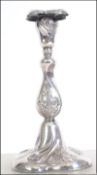 A silver 20th century continental candlestick having single sconce, the base marked for 830S .