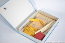 A collection of mid century Silver Scissors sewing patterns all bound together in a single folder