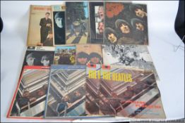The Beatles - A good collection of long play vinyl LP records all pertaining to The Beatles to
