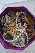 A box of assorted costume jewellery to include bracelets, earrings, necklaces,