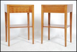 A good pair of 1970's Danish style teak wood bedside cabinets being raised on squared legs with
