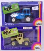 SIKU: Two Siku diecast detailed model tractors - 2852 & 2855.