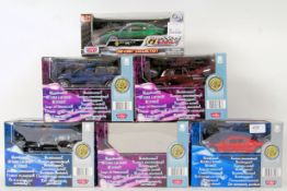 MOTOR MAX: A collection of 5x Motor Max diecast model 1:24 scale cars, to include Lotus and others.