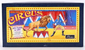 BRITAINS: An original Britains Circus diecast / lead figure set 8672 Lion Tamer & Lion.