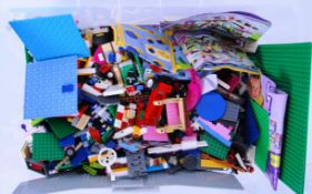 LEGO: A large crate of assorted loose Lego to include wheels, some ' Friends ,' minifigures,