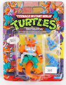 TEENAGE MUTANT NINJA TURTLES: An original vintage 1990's Playmates made Teenage Mutant Ninja