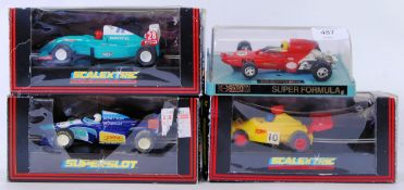 SCALEXTRIC: A collection of 4x boxed Scalextric slot racing cars, comprising of; C453, H583,