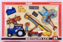 BRITAINS: A rare Britains Gift Set 9590 Ford 6600 Farm Tracor & Implements Set.