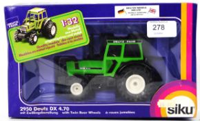 SIKU: A boxed Siku diecast model Tractor - 2950 Deutz DX 4.70. Mint, in original box.