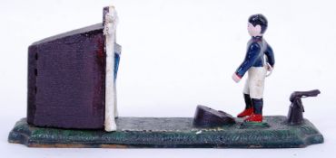 MONEY BOX: A vintage Victorian style 20th century cast iron hand painted automaton style money box