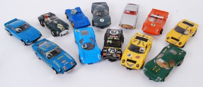 SCALEXTRIC: A collection of 12x vintage Scalextric slot racing cars, to include Electra,