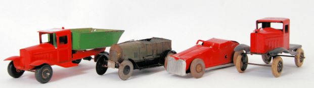 TINPLATE: A collection of 4x pre-war made tinplate vehicles.