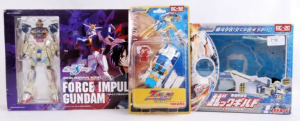 JAPANESE IMPORTS: A collection of 3x Japanese Import boxed toys - to include a Ban Dai made Force