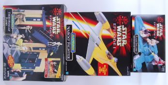 STAR WARS: A collection of three Star Wars Episode One sealed unused playsets by Hasbro.