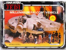 STAR WARS: An original vintage Star Wars Millennium Falcon action figure playset.