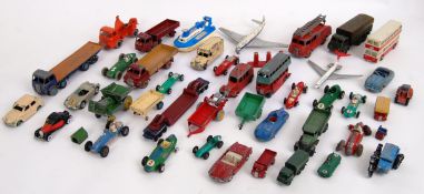 CORGI & DINKY: A collection of assorted loose playworn vintage Corgi,