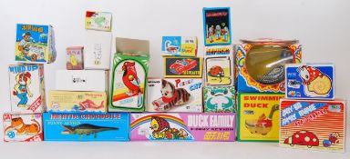 TINPLATE: A large collection of 27x assorted vintage Russian / Chinese made tinplate clockwork