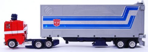 TRANSFORMERS: An original 1980's Hasbro made G1 Transformers ' Optimus Prime ,' action figure.
