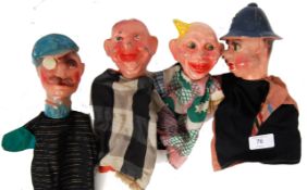 PUPPETS: An unusual collection of 1950's composition headed hand puppets - all caricatures.