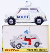 DINKY: An original vintage Dinky Toys diecast model 250 Police Mini Cooper.