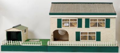 DOLLS HOUSE: A 20th century likely scratch built scale dolls house.