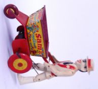 MARX SAM THE GARDENER: A rare vintage Marx Toys tinplate clockwork ' Sam The Gardener ' toy.