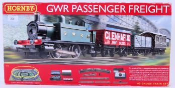 HORNBY: A Hornby 00 Gauge GWR Passenger Freight Set R1138. Within the original box.