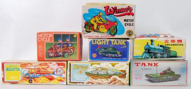 TINPLATE: A collection of 7x vintage tinplate clockwork / friction operated toys to include