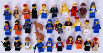 LEGO: A collection of 30x Lego minifigures (and 2x dogs) to include vintage, Indiana Jones,