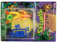 TEENAGE MUTANT NINJA TURTLES: An original vintage Playmates Teenage Mutant Ninja Turtles carded