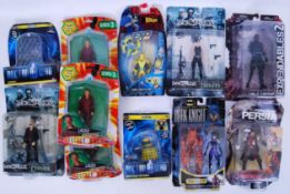ACTION FIGURES: A collection of 11x carded action figures to include Doctor Who, Batman, The Matrix,