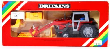 BRITAINS: An original Britains diecast model Farm Tractor 9595 Massey Ferguson.