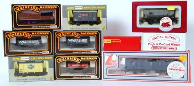 00 GAUGE: A collection of assorted boxed vintage 00 gauge rolling stock, to include Mainline, Dapol,