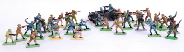 BRITAINS: A collection of assorted vintage Britains Deetail soldiers - US, German and British.