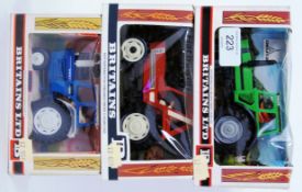 BRITAINS: A collection of 3x Britains Farm diecast model Tractors - 9524, 9528, and 9526.