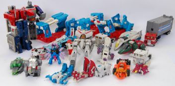 TRANSFORMERS: A large collection of assorted vintage 1980's G1 (mostly) Transformers action figures