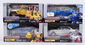TRANSFORMERS: A collection of 4x Japanese import Takara / Tomy made Transformers models - BT06