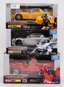 TRANSFORMERS: A collection of 3x Japanese import Takara / Tomy made Transformers models - BT22