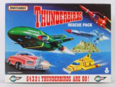 THUNDERBIRDS: A Matchbox presentation Thunderbirds Rescue Pack set of diecast models.