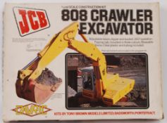 DAVRIC: A rare Davric JCB licensed ' 808 Crawler Excavator ' Tony Brown Models plastic model kit.