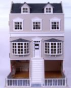 DOLLS HOUSE & SHOP: A beautiful 20th century dolls house with basement shop.