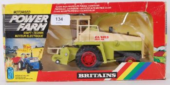 BRITAINS: An original vintage Britains Motorised Power Farm diecast model 9323 Self Propelled