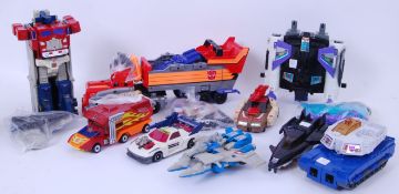TRANSFORMERS: A collection of vintage 1980's mostly G1 Transformers by Hasbro,
