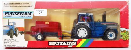 BRITAINS: An original vintage Britains Farm diecast model 9381 Ford Tractor With Spreader.