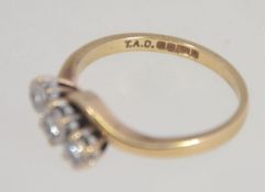 A 9ct gold and diamond ladies 3 stone ri